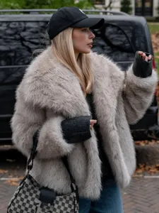 Detail shot of women's beige faux fur lapel coat, featuring plush winter texture and cozy fit.