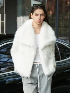 Women fashion loose faux fur lapel jacket detail view, stylish spring outerwear piece.