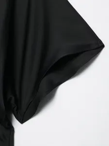Black dress sleeve detail, smooth fabric texture, elegant casual style fashion new.