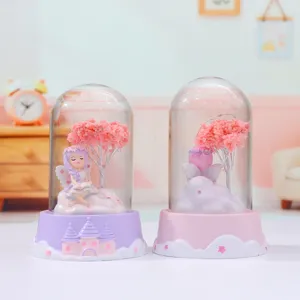 Close-up detail of cute fairy glass dome night light, magical bedroom decor desktop ornament.