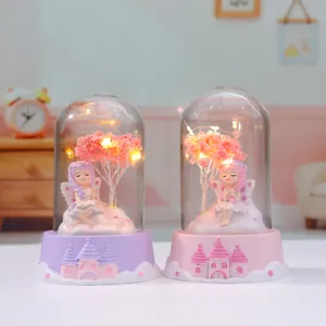 Detailed view of cute fairy glass dome night lights, perfect desktop glowing ornaments for girls.