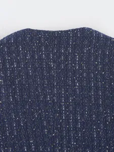 Dark blue tweed fabric detail shot for women short jacket, elegant woven texture with subtle shimmer.
