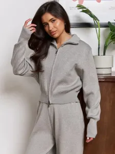 Grey knit zip-up cardigan and wide leg pants set, chic casual autumn winter outfit for women.