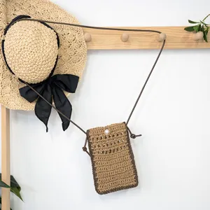 Handmade straw woven crossbody phone bag for women, cute hollow straw mini shoulder bag.