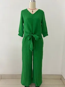 Green V-neck tie-front top and trousers two-piece set, comfortable casual detail view.