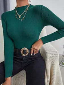 Detailed view of dark green ribbed mock neck long sleeve sweater for women autumn winter fashion.