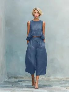 Details of the blue linen blend crop top and wide leg pants set, showcasing texture.