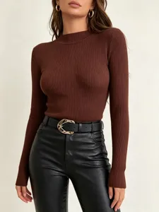Detailed view of the women's slim-fit knit sweater showcasing ribbed texture and mock neck.