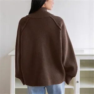 Back view of a cozy brown turtleneck knit sweater, loose fit winter apparel detail shot.