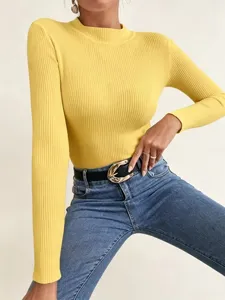 Yellow ribbed knit top detail view, soft stretch long sleeve mock neck design for daily wear.
