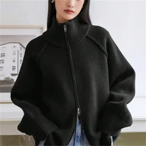 Black knit zip-up cardigan detail, high neck relaxed fit sweater, cozy autumn daily wear.
