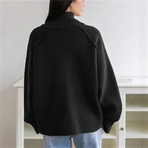 Back view detail of women solid black turtleneck sweater, casual loose knitwear top.