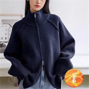 Women's navy blue high neck full zip knit cardigan sweater detail view showcasing ribbed collar.