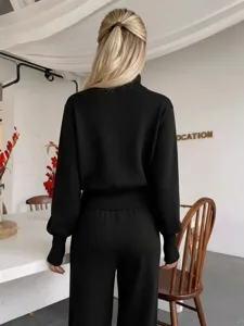 Women's black knit sweater and wide-leg pants two-piece set, casual autumn winter outfit.