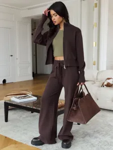Brown knit zip-up cardigan and wide leg pants set with green top for women casual wear.