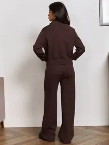 Back view detail of the brown knitted sweater and wide-leg trousers set, cozy casual look.