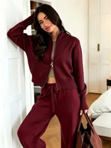 Burgundy knit zip-up cardigan and matching wide-leg trousers two-piece set, detail view.