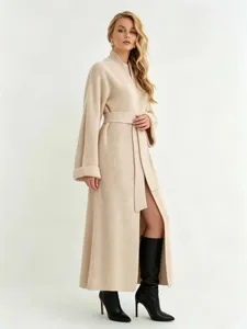Lange beige gebreide vest voor dames met riem, gezellige oversized herfsttrui jas.