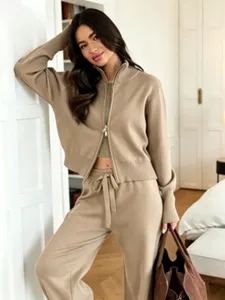 Casual knitwear set featuring a zip-up cardigan and matching wide-leg trousers for women.