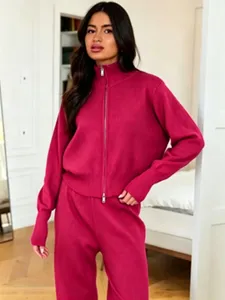 Cozy knit zip-up jacket and wide-leg trousers set, stylish casual autumn outfit detail.