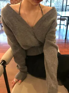 Grey V-neck wrap knit sweater for women, cozy casual long sleeve pullover top for autumn fashion.