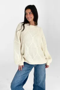 Detaillierte Ansicht des Damen grobgestrickten lockeren Pullovers in Cremeweiß mit Rauten.