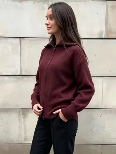 Women's stylish knit zip-up cardigan sweater in burgundy with a classic lapel and long sleeves.
