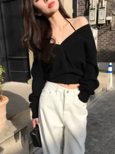 Women black V-neck knitted sweater casual loose long sleeve top paired with white pants style