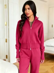 Close-up detail of the stylish rose red knit zip-up cardigan and pants set for daily wear.