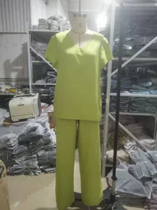 Solid color short sleeve top and trousers set for women, casual summer lounge outfit.