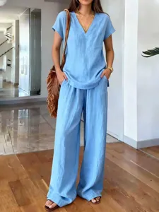 Summer blue casual two-piece set featuring a short sleeve V-neck top and wide-leg pants.