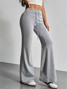 Detailed view of women's grey high waist casual flare pants with adjustable drawstring.