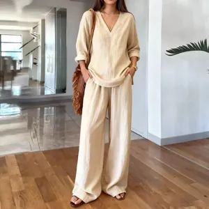 Casual women's spring V-neck long sleeve pullover and wide leg trousers clothing set.