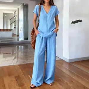 Summer casual solid color V-neck short sleeve top and wide leg pants two piece set for women.