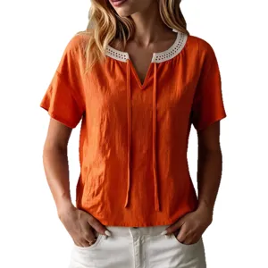 Women summer short sleeve orange blouse with eyelet lace trim V-neck and cute front ties.