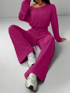 Casual off-shoulder sweatshirt and wide-leg sweatpants set, stylish solid color design for women.