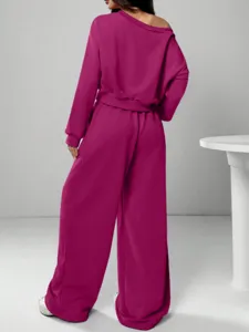 Women casual off-the-shoulder sweatshirt and wide leg pants matching lounge set in fuchsia pink color