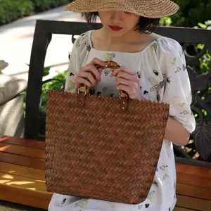 Vintage straw woven handbag with bamboo handle, large capacity vertical beach bag for women.