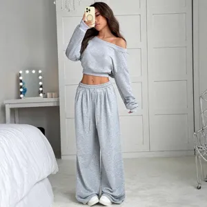 Grey off-shoulder long sleeve sweatshirt and high waist loose wide leg pants set.