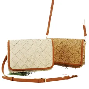 Straw woven crossbody bag with brown leather trim and diamond pattern for women summer beach fashion