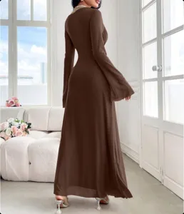 Elegant brown long sleeve maxi dress featuring trumpet sleeves and a slim fit design detail.