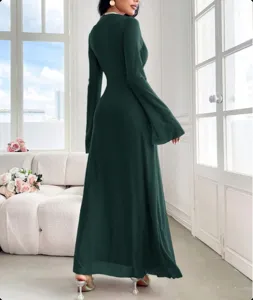 Back view detail of elegant dark green slim-fit maxi dress with chic flare long sleeves.