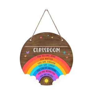 Wooden classroom hanging sign with colorful rainbow design and inspiring quotes for school decor.