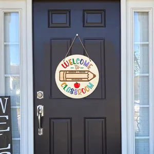 Wooden classroom welcome hanging sign detail, back-to-school door decor with pencil.