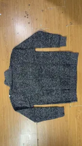 Men's black and white mixed knit cardigan sweater, casual outerwear detailed flat lay view.