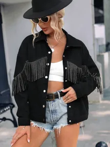Stylish black denim jacket for women featuring dazzling rhinestone fringe and chic lapel.