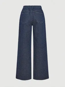 Detailed back view of women's high-waisted wide-leg trousers with unique woven pattern.