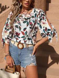 Camicetta donna stampa floreale mezza manica con grazioso fiocco e maniche spaccate.