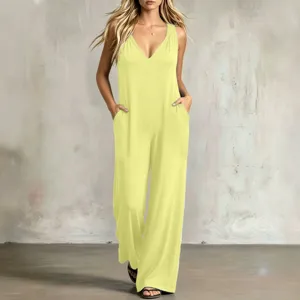 Detailed view of the casual V-neck sleeveless pocket jumpsuit in bright yellow tone.