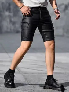 Detail shot of men's black PU leather cargo shorts, slim fit design with side utility pockets.